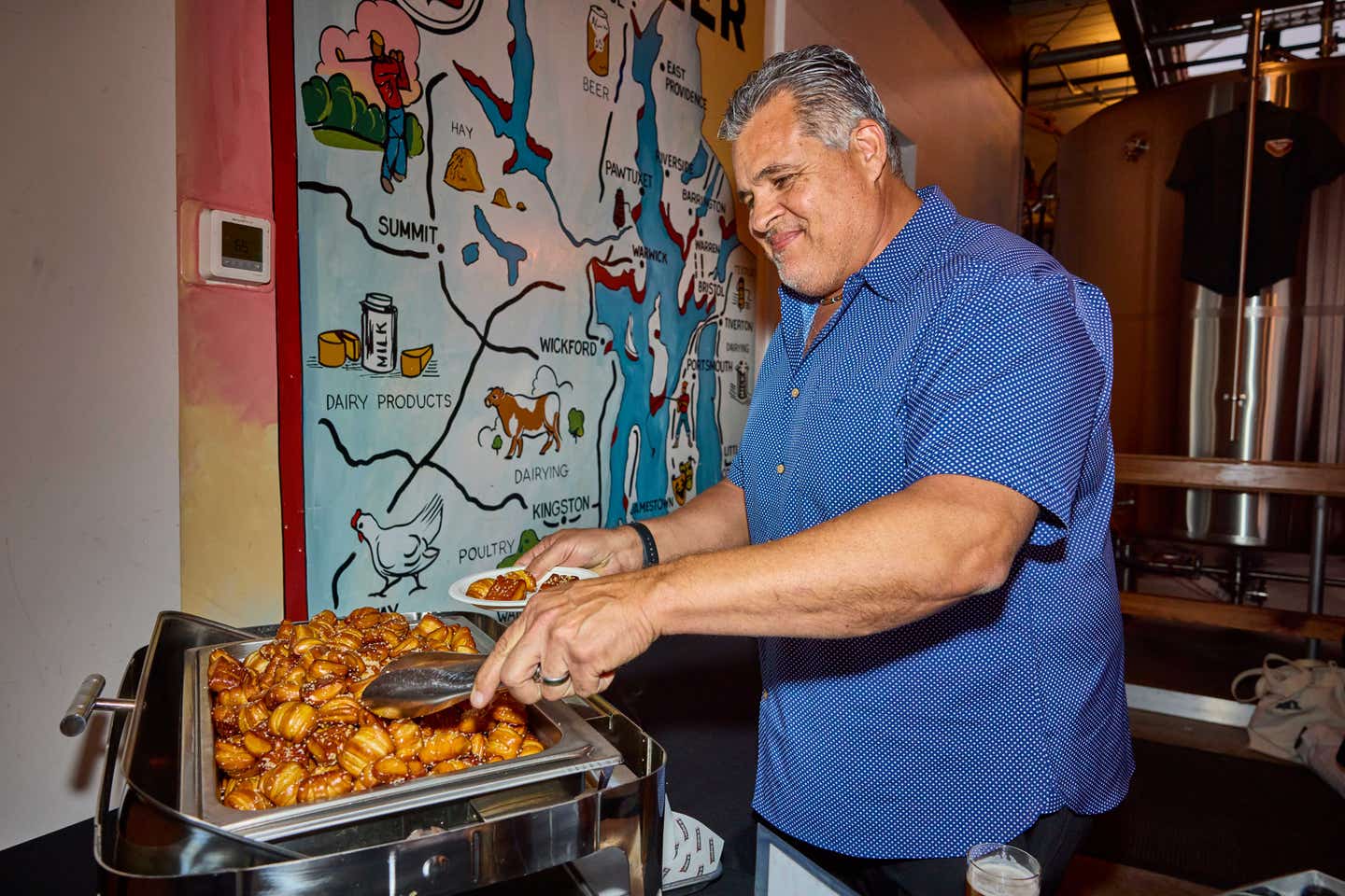George Vargas, plant manager of Meridian Printing, sampled the brewery's fresh pretzel bites. George Vargas, plant manager of Meridian Printing, sampled the brewery's fresh pretzel bites.